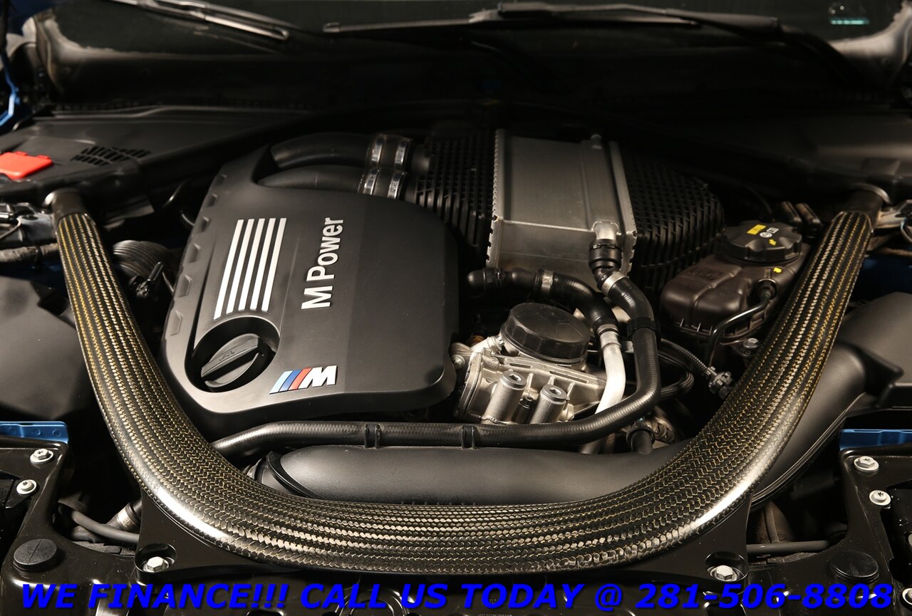 2017 BMW M4 2017 COMP PKG NAV SUN CARBON YAS MARINA   - Photo 22 - Houston, TX 77031