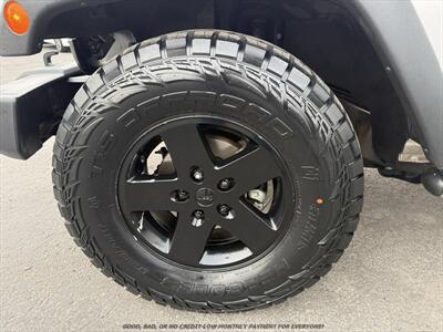 2012 Jeep Wrangler Unlimited Sport   - Photo 11 - Garden City, ID 83714