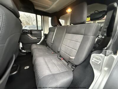 2012 Jeep Wrangler Unlimited Sport   - Photo 16 - Garden City, ID 83714