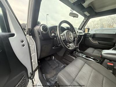 2012 Jeep Wrangler Unlimited Sport   - Photo 12 - Garden City, ID 83714
