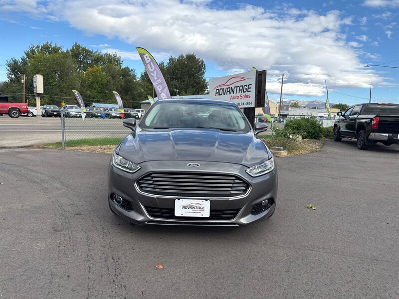2013 Ford Fusion Hybrid Titanium 4dr Sedan - Photo 2 - Garden City, ID 83714