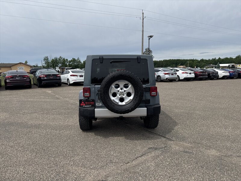 2014 Jeep Wrangler Unlimited Sahara - Photo 8 - Brainerd, MN 56401