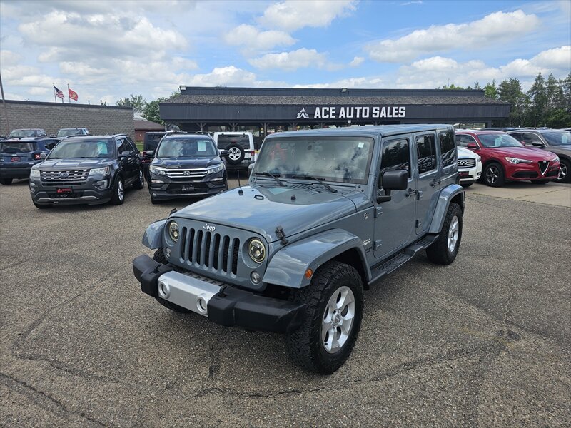 2014 Jeep Wrangler Unlimited Sahara   - Photo 1 - Brainerd, MN 56401