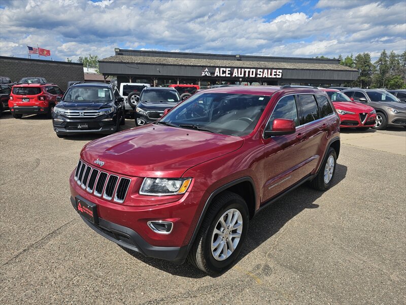 Deep Cherry Red Crystal Pearl Coat 2015 Jeep Grand Cherokee Laredo 4WD SUV / Crossover Four-Wheel Drive 8-Speed Automatic
