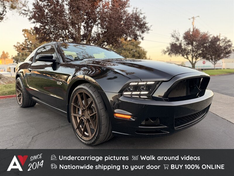 Black 2014 Ford Mustang Coupe Rear-Wheel Drive 5-Speed Manual