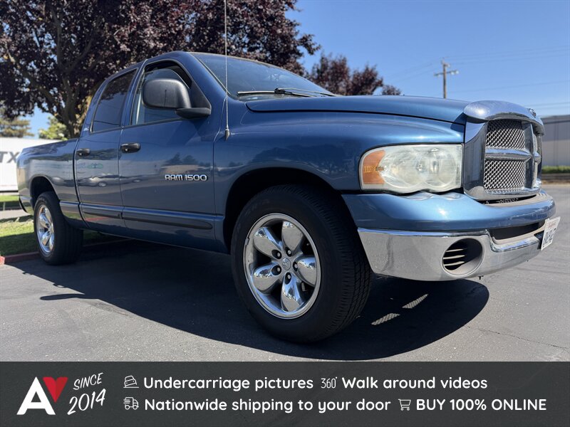 Patriot Blue Pearlcoat/Bright Silver Metallic Clea 2002 Dodge RAM 1500 SLT Quad Cab RWD Pickup Truck Rear-Wheel Drive Automatic