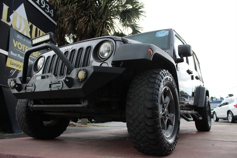 2017 Jeep Wrangler Unlimited Sport   - Photo 1 - Lexington, SC 29073