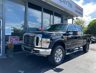 2010 Ford F-250 Lariat  6 MONTHS SAME AS CASH - Photo 2 - Wilton Maners, FL 33311