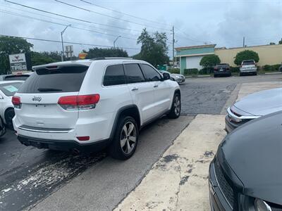 2014 Jeep Grand Cherokee Limited  6 MONTHS SAME AS CASH - Photo 4 - Wilton Maners, FL 33311