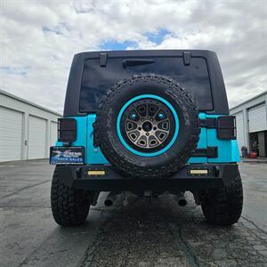 2018 Jeep Wrangler JK Unlimited Freedom Edition   - Photo 5 - West Haven, UT 84401