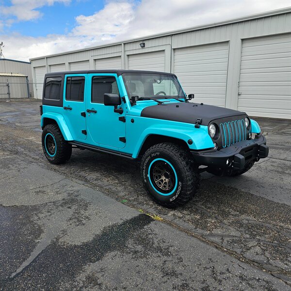 2018 Jeep Wrangler JK Unlimited Freedom Edition   - Photo 1 - West Haven, UT 84401