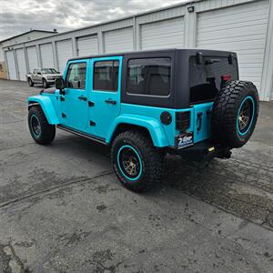 2018 Jeep Wrangler JK Unlimited Freedom Edition   - Photo 4 - West Haven, UT 84401