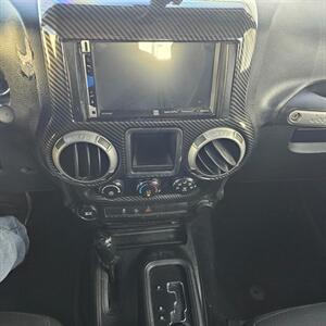 2015 Jeep Wrangler Unlimited Freedom Edition   - Photo 17 - West Haven, UT 84401