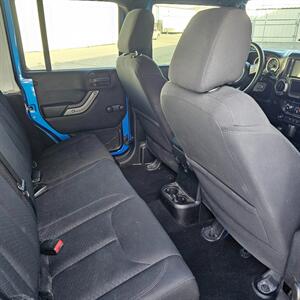 2015 Jeep Wrangler Unlimited Freedom Edition   - Photo 11 - West Haven, UT 84401