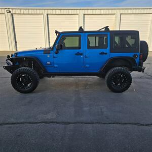 2015 Jeep Wrangler Unlimited Freedom Edition   - Photo 3 - West Haven, UT 84401