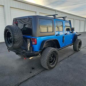 2015 Jeep Wrangler Unlimited Freedom Edition   - Photo 5 - West Haven, UT 84401