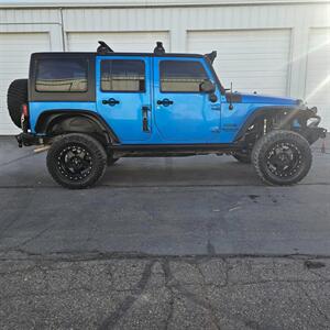 2015 Jeep Wrangler Unlimited Freedom Edition   - Photo 6 - West Haven, UT 84401