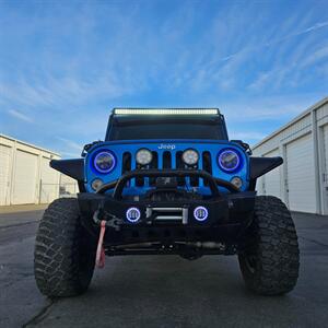 2015 Jeep Wrangler Unlimited Freedom Edition   - Photo 24 - West Haven, UT 84401