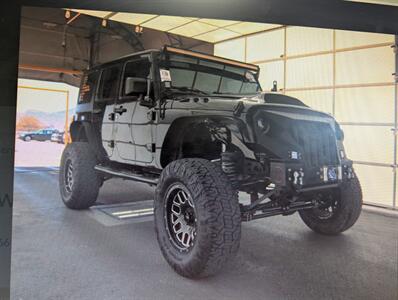 2017 Jeep Wrangler Unlimited Sport S   - Photo 1 - West Haven, UT 84401
