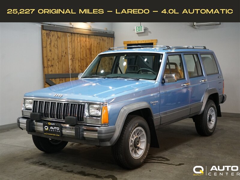 Blue 1989 Jeep Cherokee Pioneer 4-Door 4WD SUV / Crossover Four-Wheel Drive Automatic