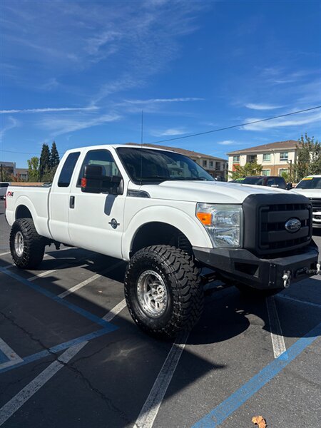2015 Ford F-250 Super Duty XLT, 6.7 power stroke diesel 4 x 4 lifted 37s  