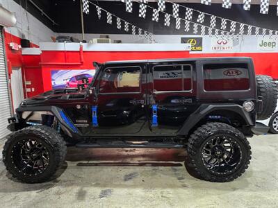 2016 Jeep Wrangler Unlimited Sport S   - Photo 2 - Miami, FL 33155