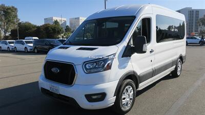 2023 Ford Transit 350 XLT  Mid Roof 9 Passenger Captain Seats - Photo 9 - Long Beach, CA 90807