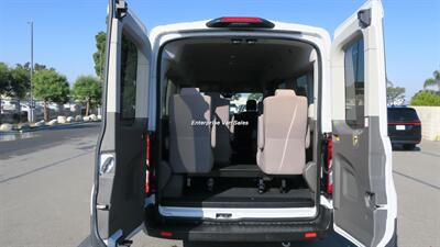 2023 Ford Transit 350 XLT  Mid Roof 9 Passenger Captain Seats - Photo 12 - Long Beach, CA 90807