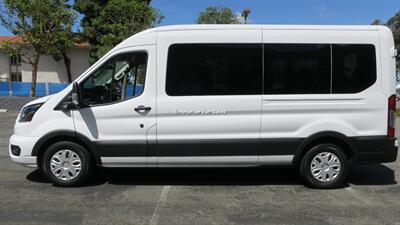 2023 Ford Transit 350 XLT  Mid Roof 9 Passenger Captain Seats - Photo 8 - Long Beach, CA 90807