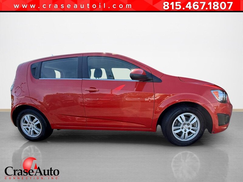 Inferno Orange Metallic 2012 Chevrolet Sonic 1LT Hatchback FWD Hatchback Front-Wheel Drive 6-Speed Manual