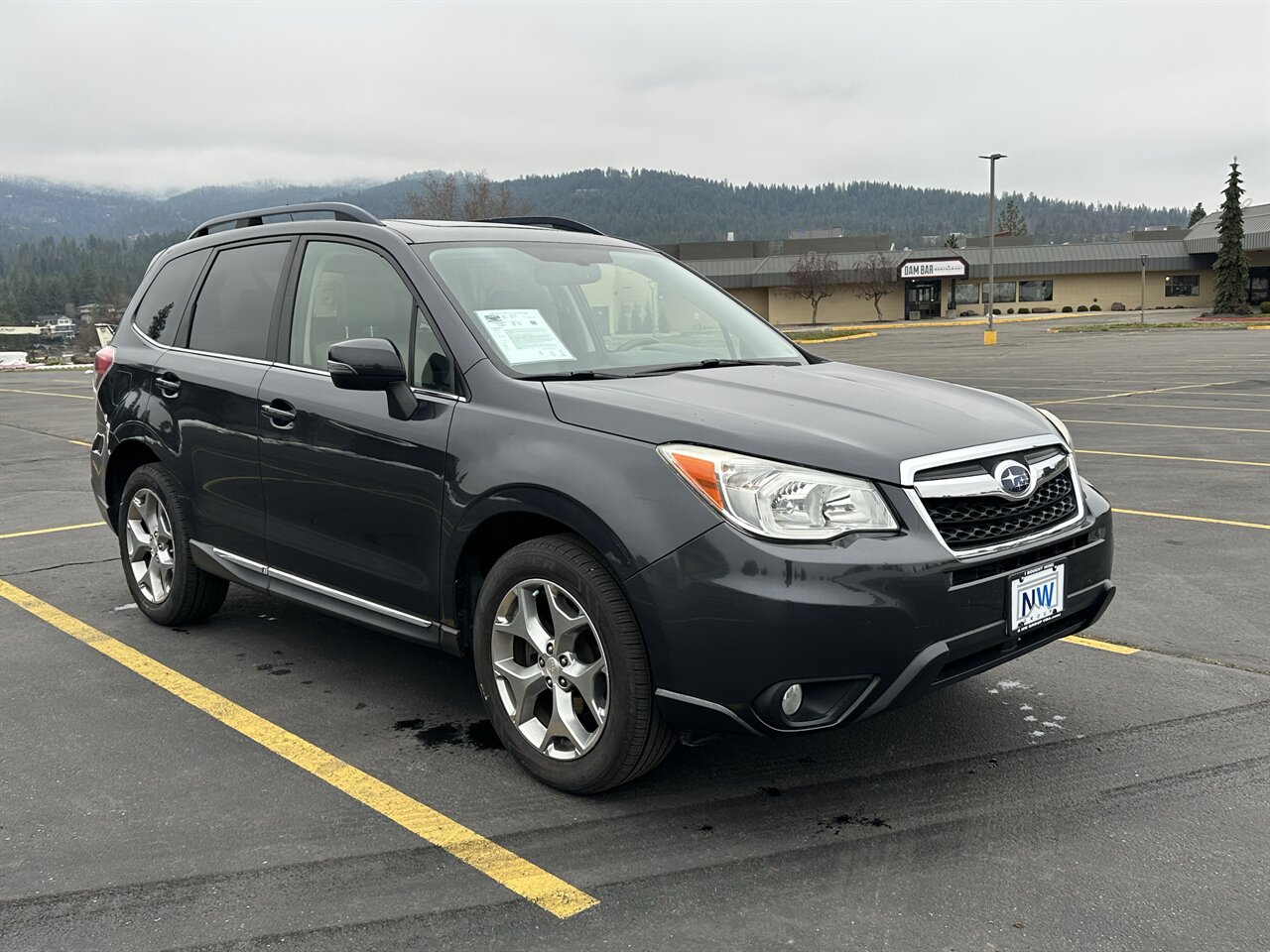 2015 Subaru Forester 2.5i Touring. All Wheel Drive, Loaded, Leather, Harmon Kardon Audio! - Photo 1 - Post Falls, ID 83854