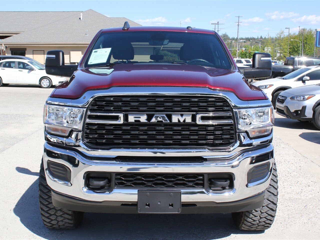 2024 RAM 2500 Big Horn. Factory Lift with Custom Brand Wheels and Tires, 4k miles, Superb truck! - Photo 2 - Post Falls, ID 83854