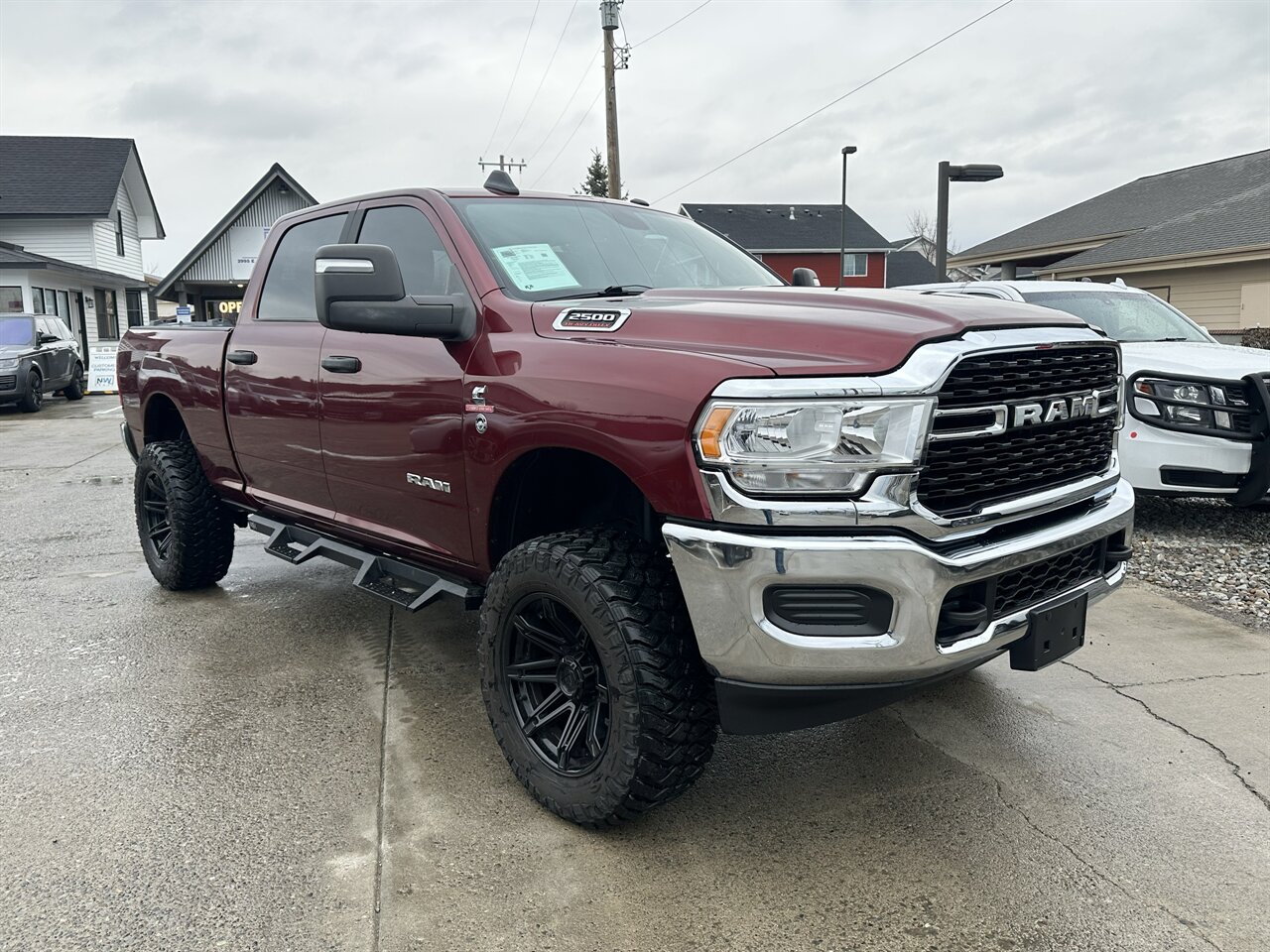 2024 RAM 2500 Big Horn Factory Lift with Custom Brand Wheels and Tires, 4k miles, Superb truck! - Photo 1 - Post Falls, ID 83854
