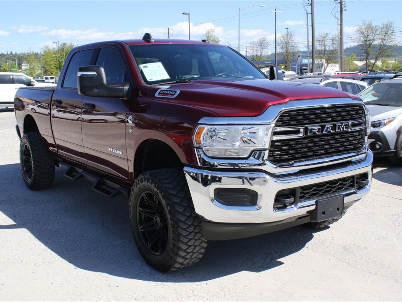 2024 RAM 2500 Big Horn. Factory Lift with Custom Brand Wheels and Tires, 4k miles, Superb truck! - Photo 1 - Post Falls, ID 83854