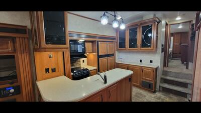 2014 Keystone MONTANA 343RL - Photo 13 - Aurora, MO 65605