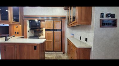 2014 Keystone MONTANA 343RL - Photo 8 - Aurora, MO 65605