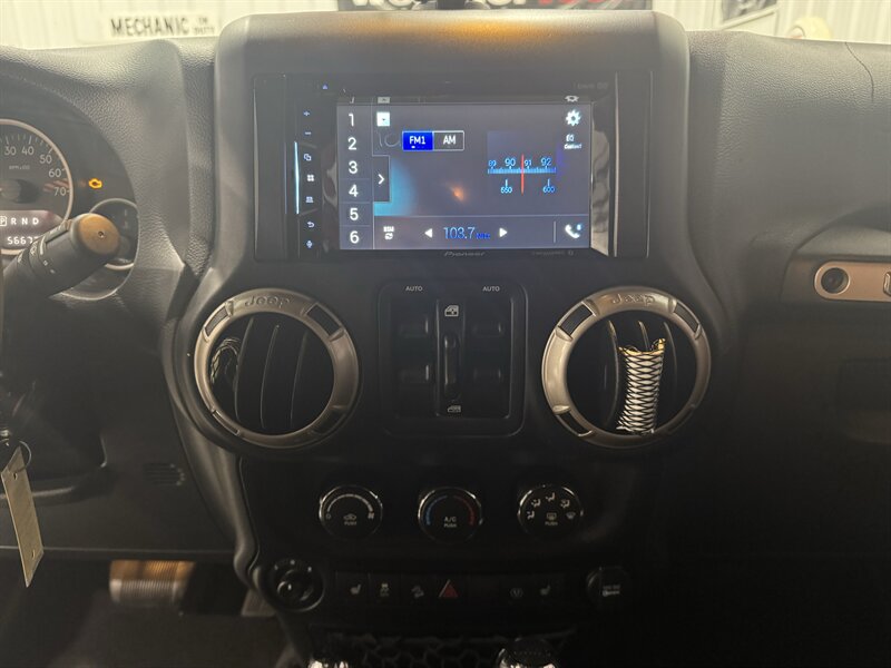 2016 Jeep Wrangler Unlimited Sahara 75th Anniversary - Photo 10 - Rochelle, IL 61068
