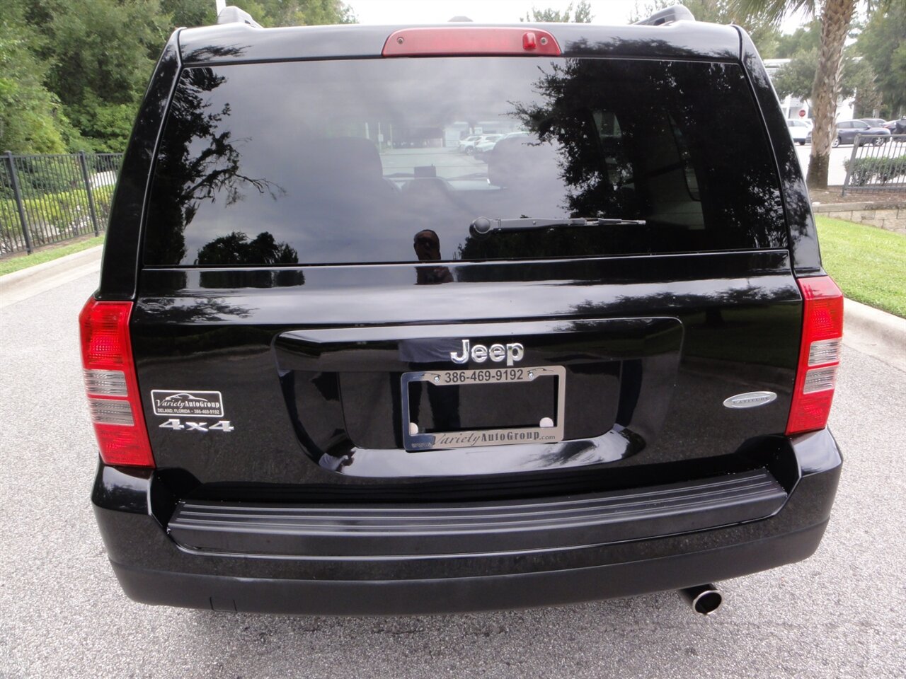 2014 Jeep Patriot Latitude 4x4 - Photo 14 - Deland, FL 32720