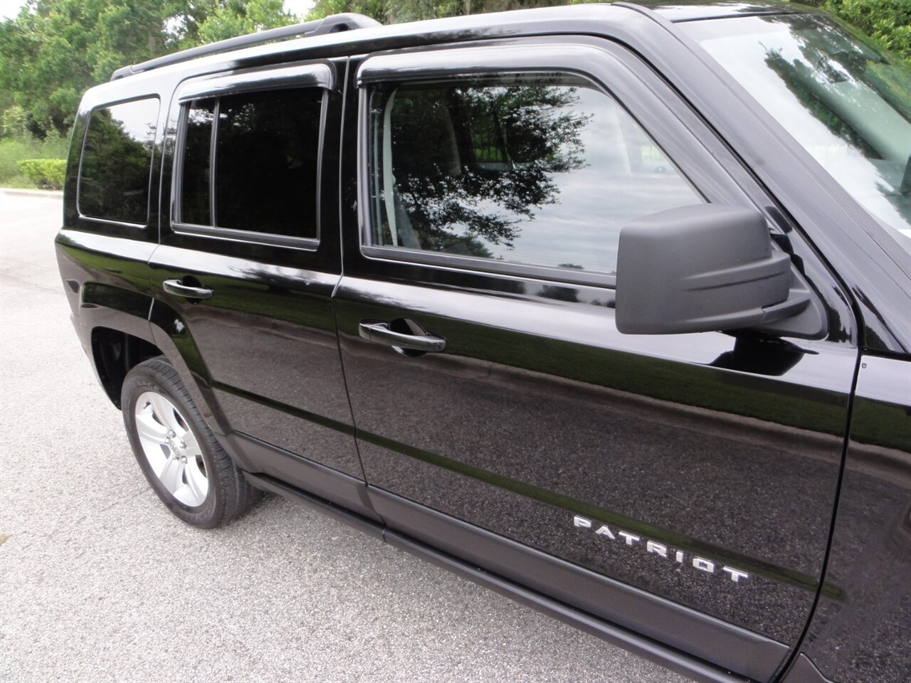 2014 Jeep Patriot Latitude 4x4 - Photo 10 - Deland, FL 32720