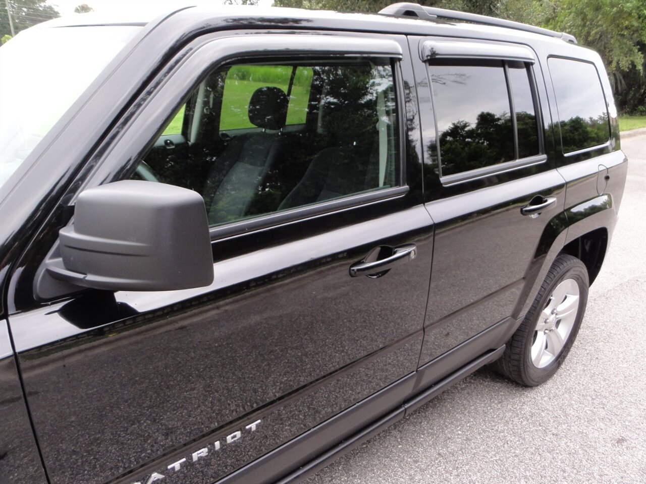 2014 Jeep Patriot Latitude 4x4 - Photo 11 - Deland, FL 32720