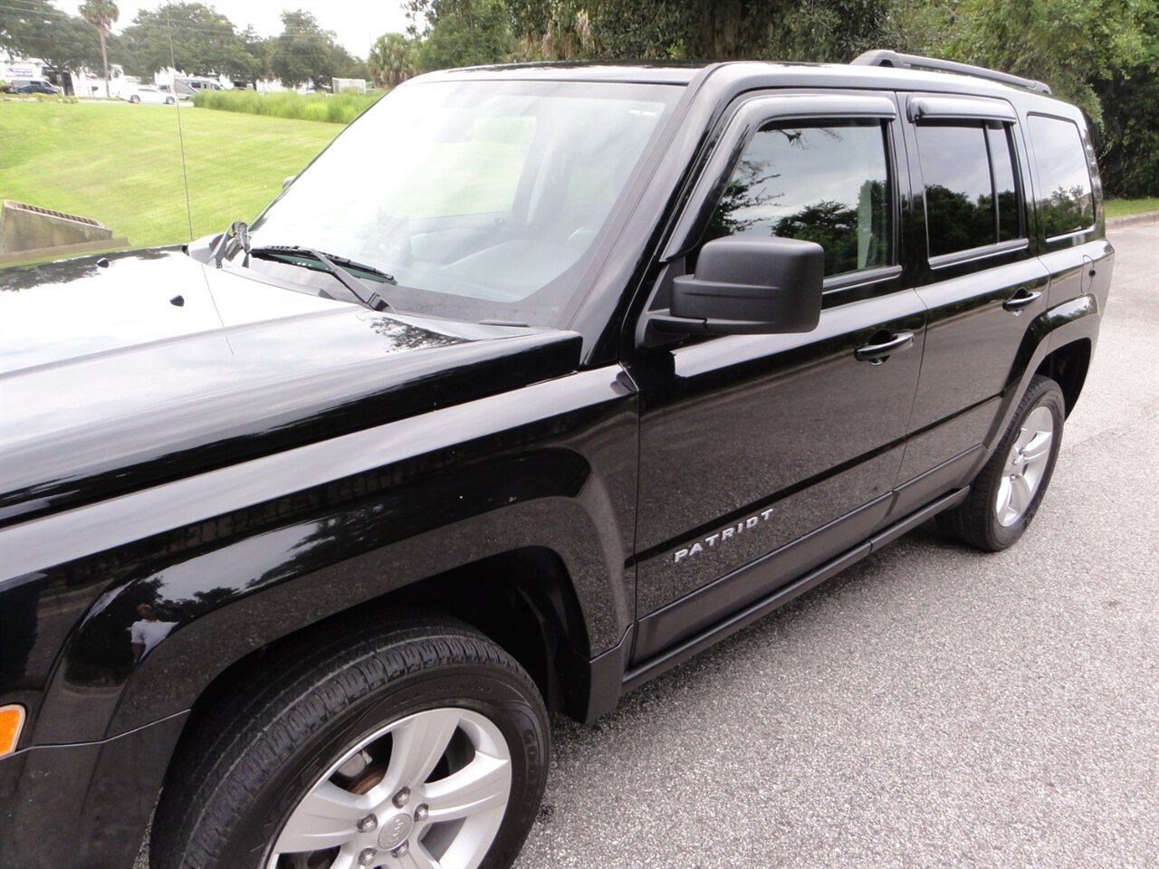 2014 Jeep Patriot Latitude 4x4 - Photo 9 - Deland, FL 32720