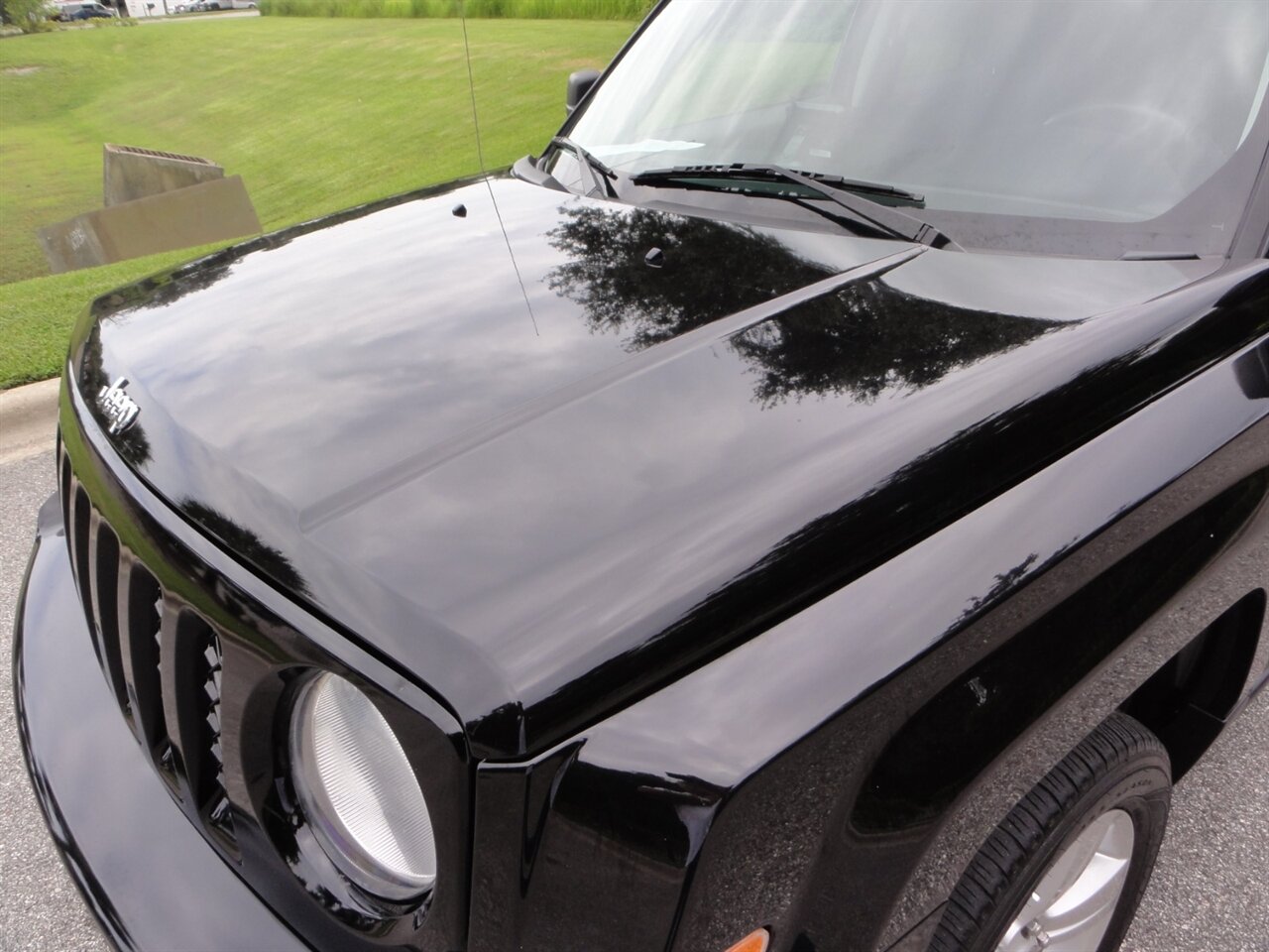 2014 Jeep Patriot Latitude 4x4 - Photo 17 - Deland, FL 32720