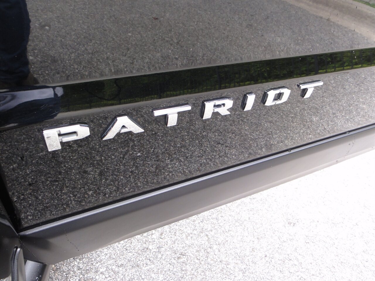 2014 Jeep Patriot Latitude 4x4 - Photo 25 - Deland, FL 32720