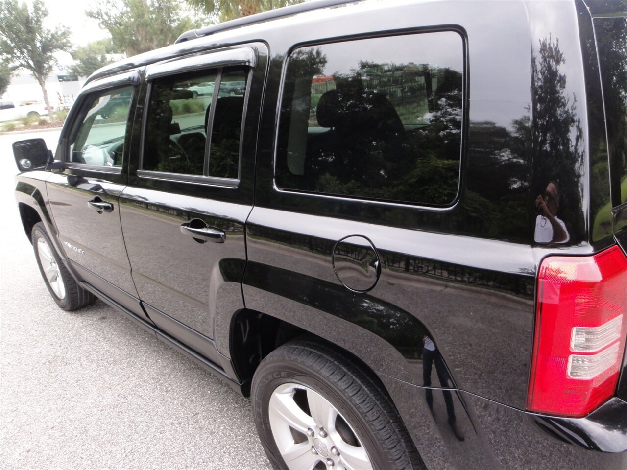2014 Jeep Patriot Latitude 4x4 - Photo 12 - Deland, FL 32720