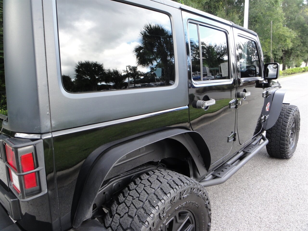 2015 Jeep Wrangler Unlimited Rubicon   - Photo 13 - Deland, FL 32720