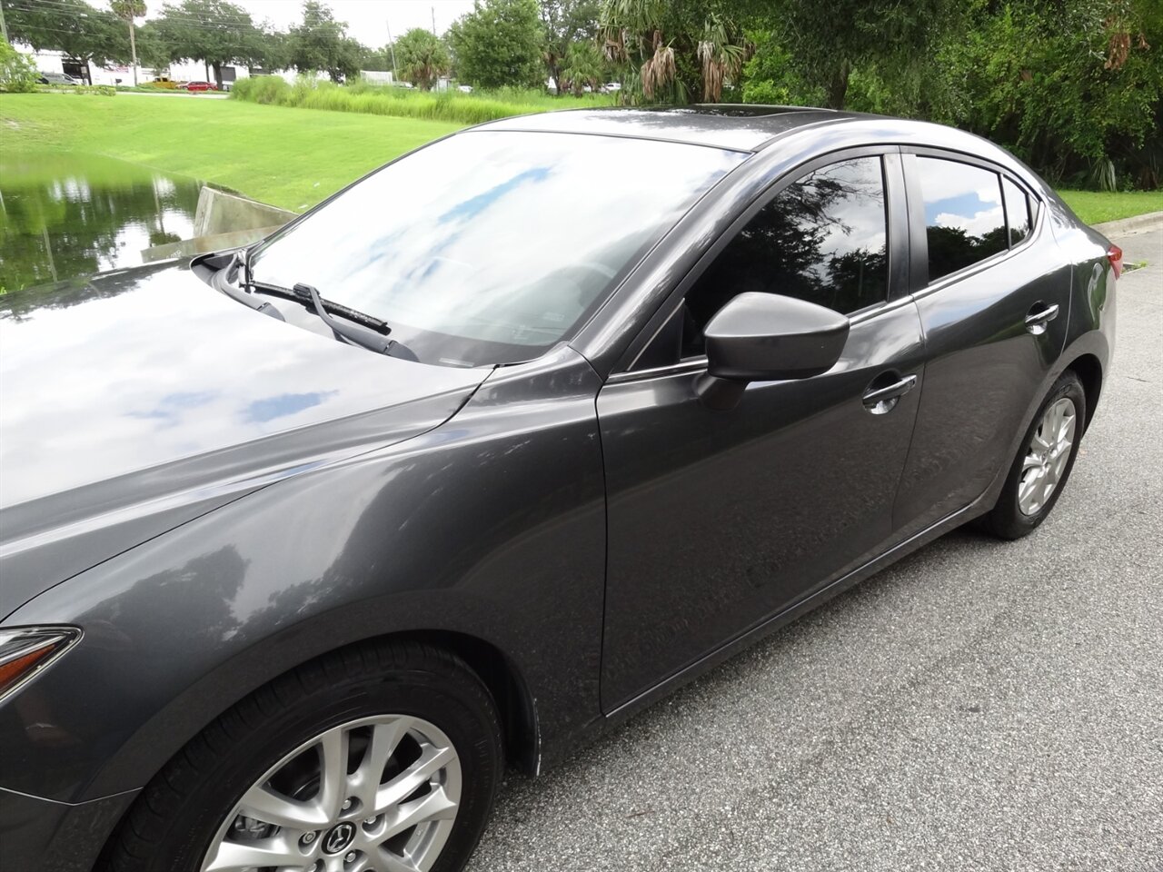 2014 Mazda Mazda3 i Grand Touring Premium - Photo 9 - Deland, FL 32720