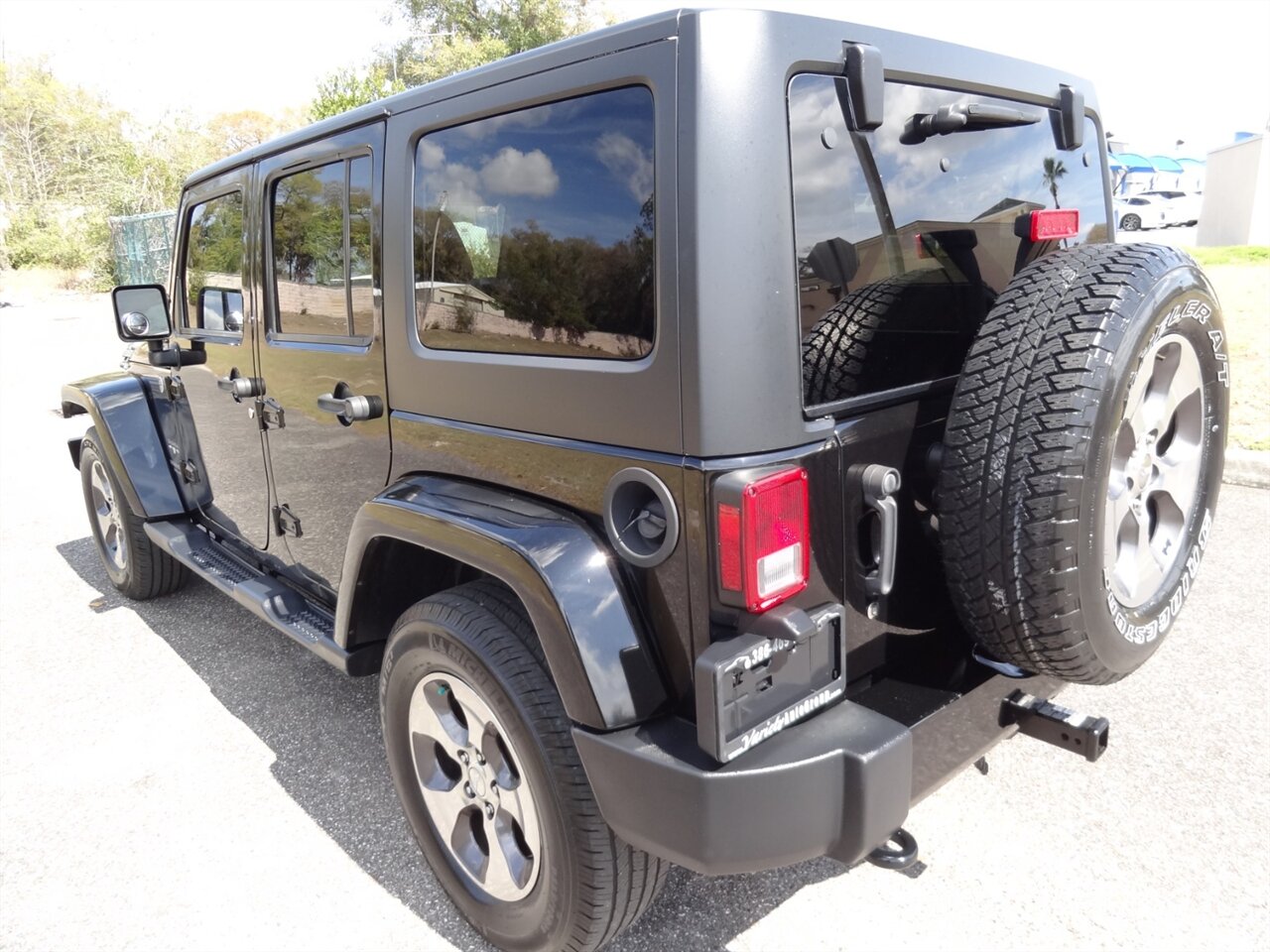 2017 Jeep Wrangler Unlimited Sahara - Photo 4 - Deland, FL 32720