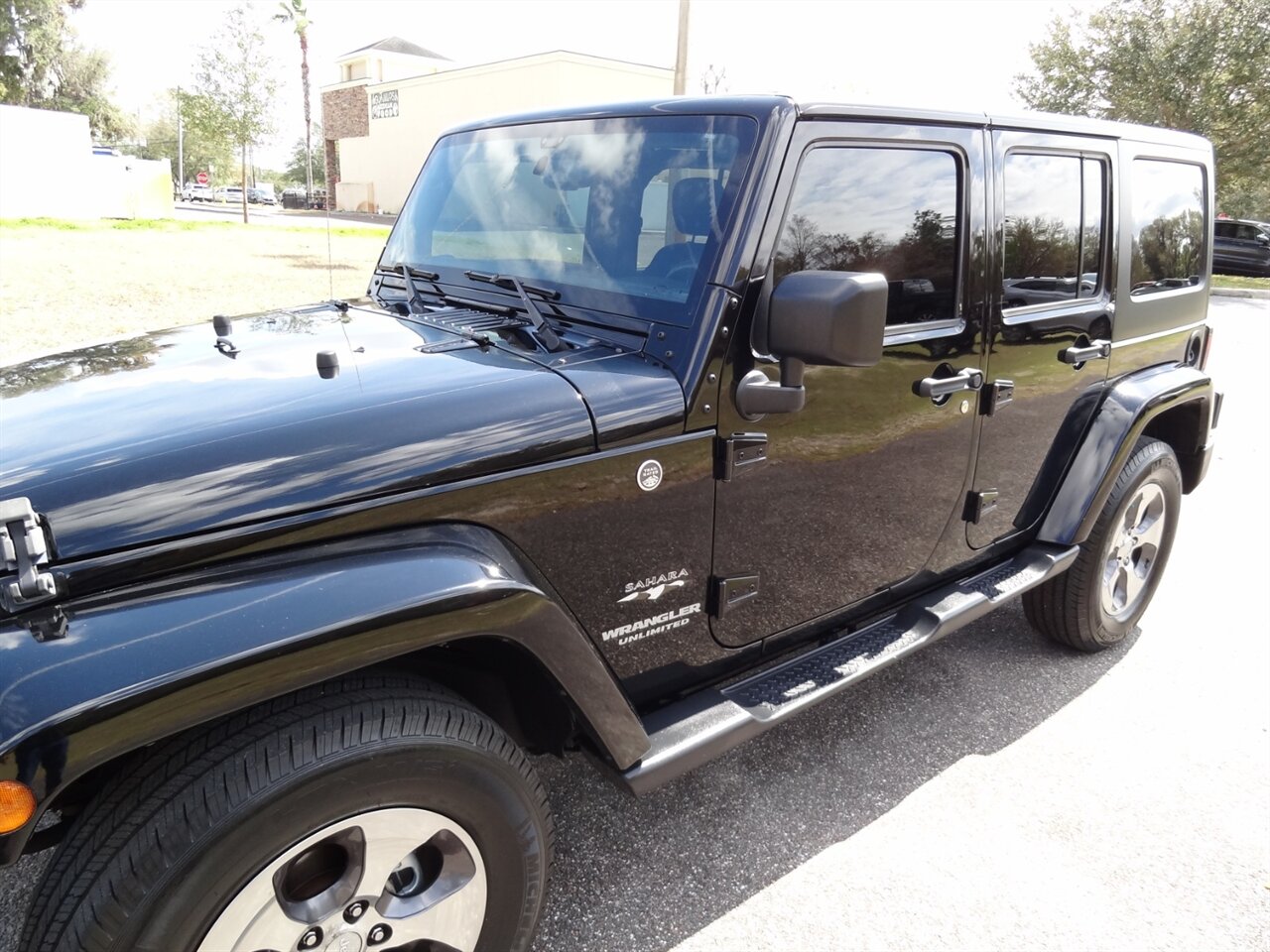 2017 Jeep Wrangler Unlimited Sahara - Photo 11 - Deland, FL 32720