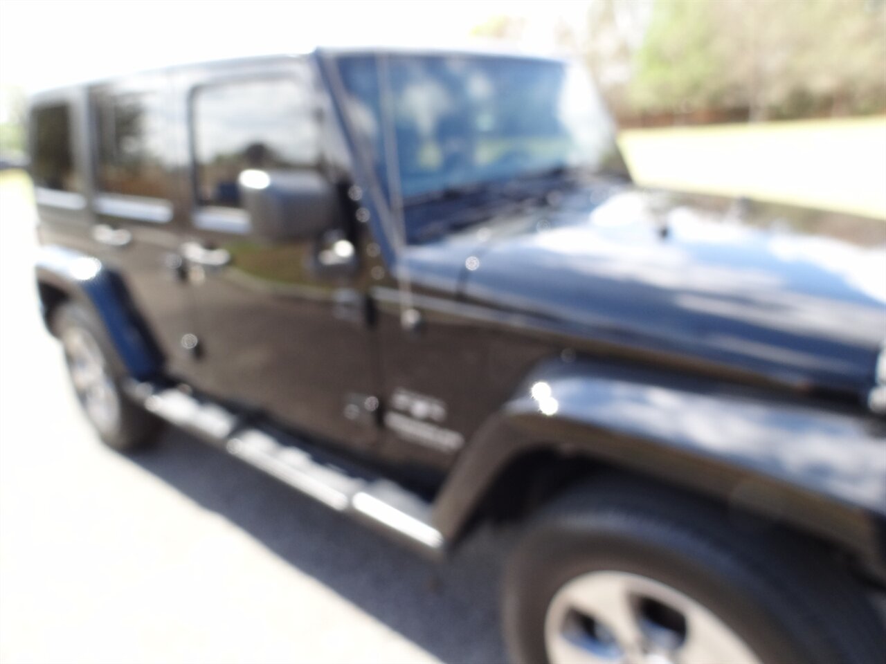 2017 Jeep Wrangler Unlimited Sahara - Photo 10 - Deland, FL 32720