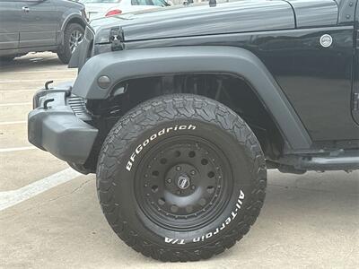 2014 Jeep Wrangler Unlimited Sport   - Photo 16 - McKinney, TX 75070